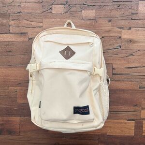 jansport main campus butter yellow/cream backpack